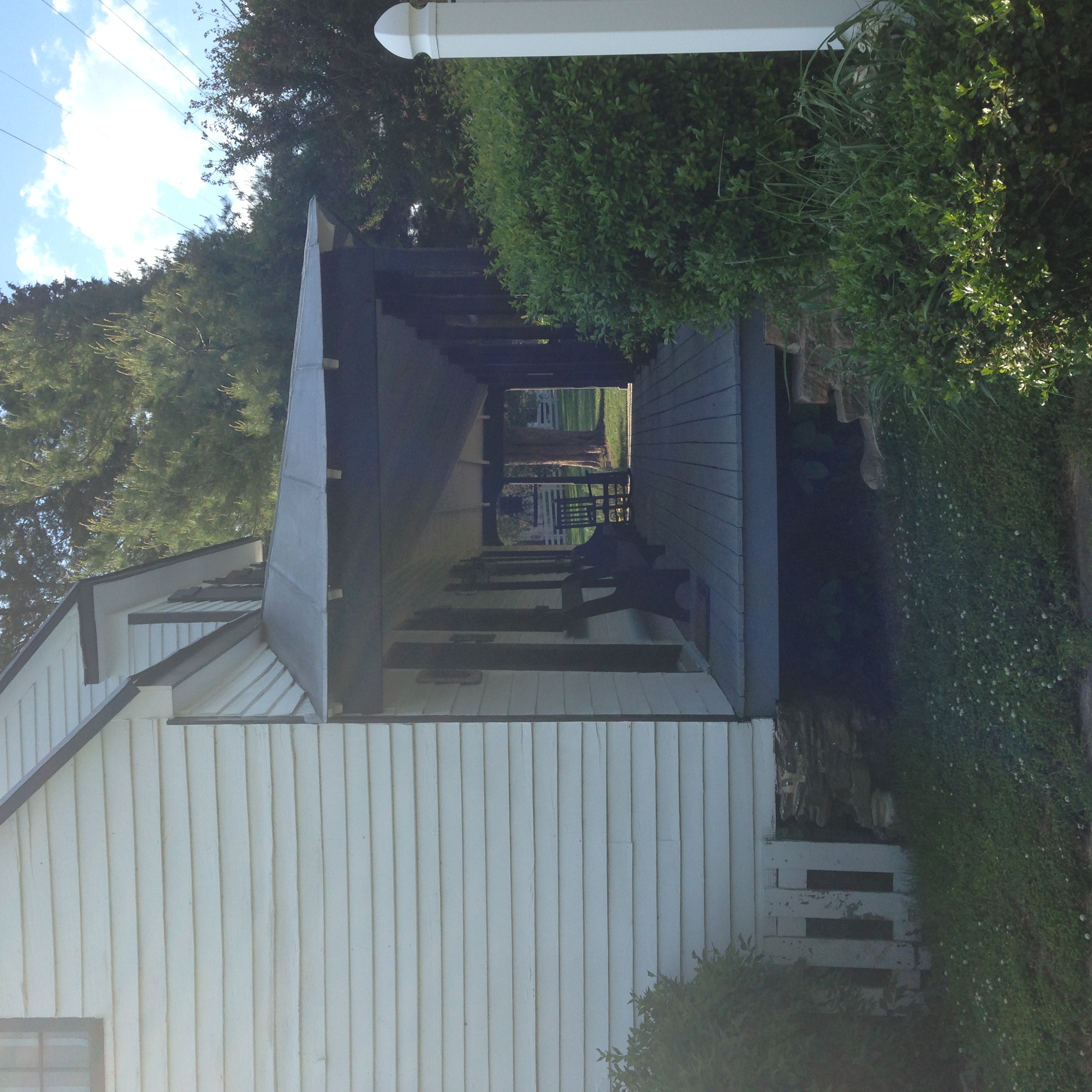 Front porch of Weems-Botts Museum with rocking chairs